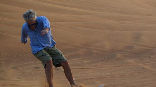 Dune Bashing with Quad Bike and Sand Boarding from Dubai 4
