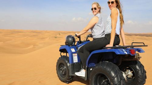 Red Dunes Safari by Quad Bike, Camel Ride, Sandboarding and BBQ at Al Khayma Camp Day Tours 2