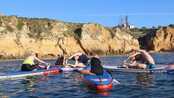 Lagos: Sunrise SUP Yoga Experience at Praia dos Estudantes