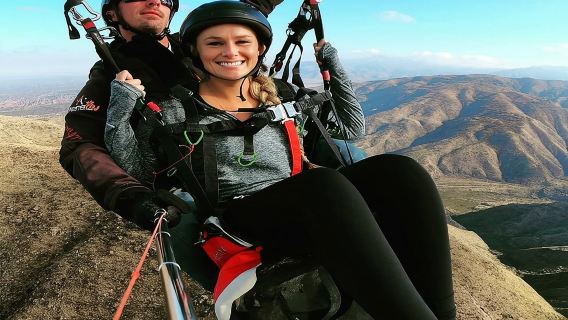 Paragliding free flight experience over the pre-range