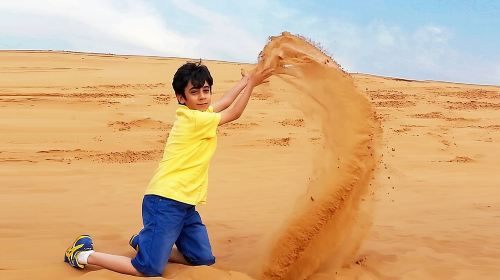 Private Morning Red Dune Safari with Camel Ride & Sandboarding 5