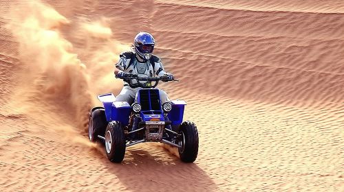 Dune Bashing with Quad Bike and Sand Boarding from Dubai 3