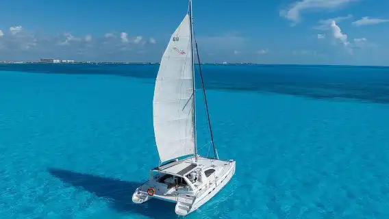 Isla Mujeres Day Tour with Catamaran, Snorkeling & Beach Club