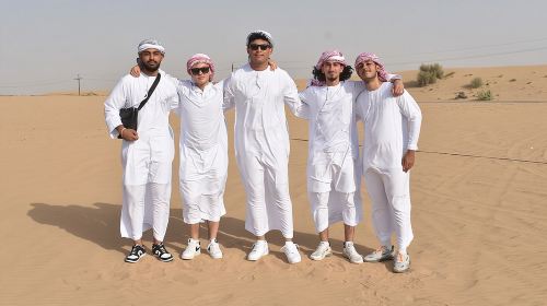 Dubai: 60Minute Self-Drive ATV Quadbike, Camel Ride, Sand Surfing 3