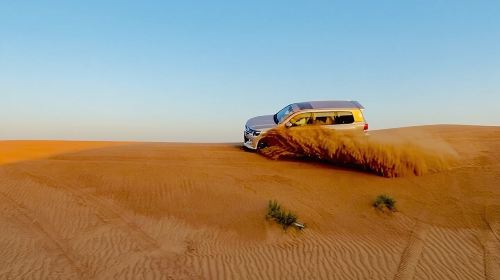 Dubai Quad Bike Tour with Camel Ride and BBQ Dinner 3