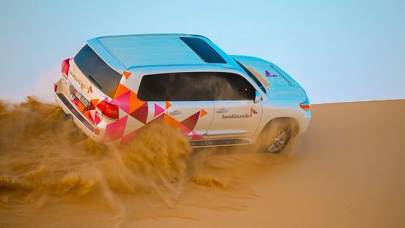 Abu Dhabi Evening Desert Safari - Dune bashing Camel ride and BBQ