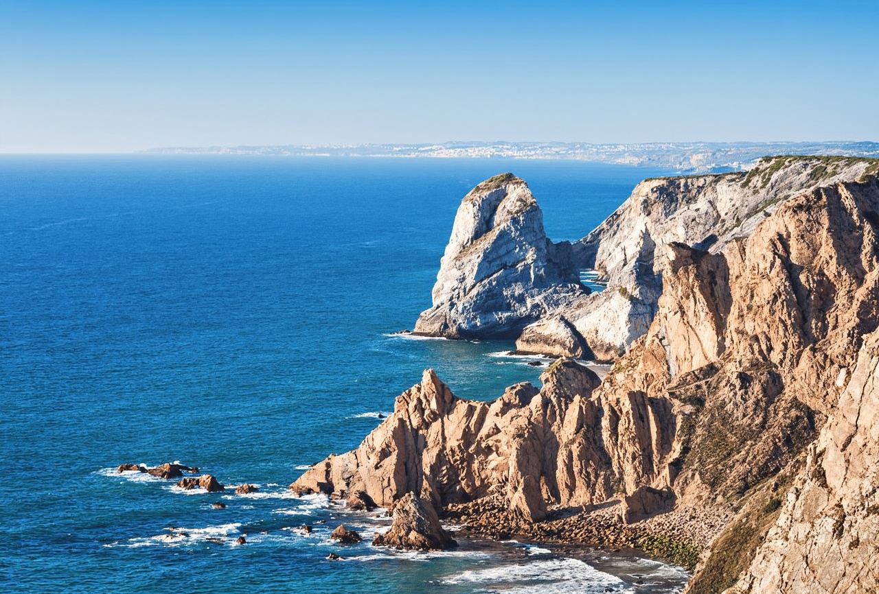 From Lisbon: Sintra, Pena Palace, Regaleira, Cabo da Roca, and Cascais