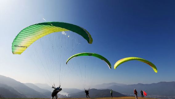 黃山宏村國際滑翔傘基地滑翔傘/動力傘/動力三角翼飛行體驗【專業教練一帶一飛行+空中俯瞰宏村美好風光】