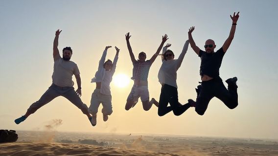 Sunset Safari with BBQ Dune Drive Camel Ride & Dune Buggy option