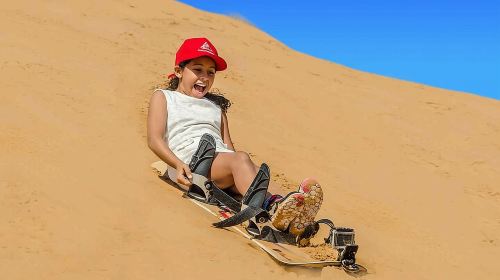 Private Morning Red Dune Safari with Camel Ride & Sandboarding 4