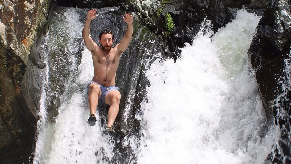 Small-Group El Yunque Waterslide Adventure & transportation 