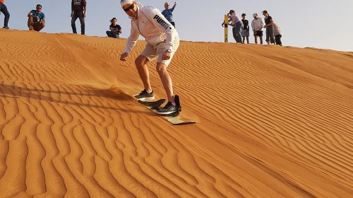 Dune Bashing with Quad Bike and Sand Boarding from Dubai 5