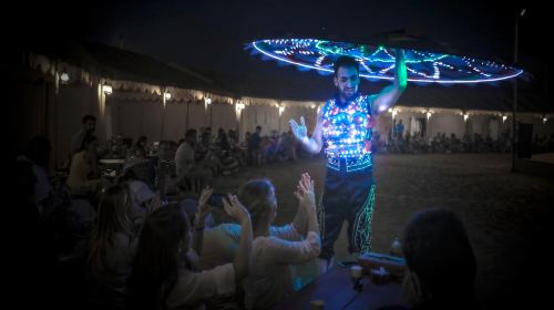 Red Dunes Safari by Quad Bike, Camel Ride, Sandboarding and BBQ at Al Khayma Camp Day Tours 4