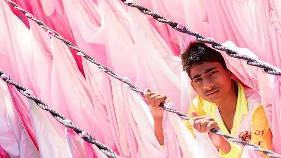 Dabbawala, Dhobi Ghat & Dharavi slum Tour with Local Train Ride