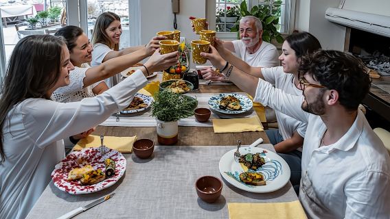 Market tour and dining experience at a Cesarina's home in Verona