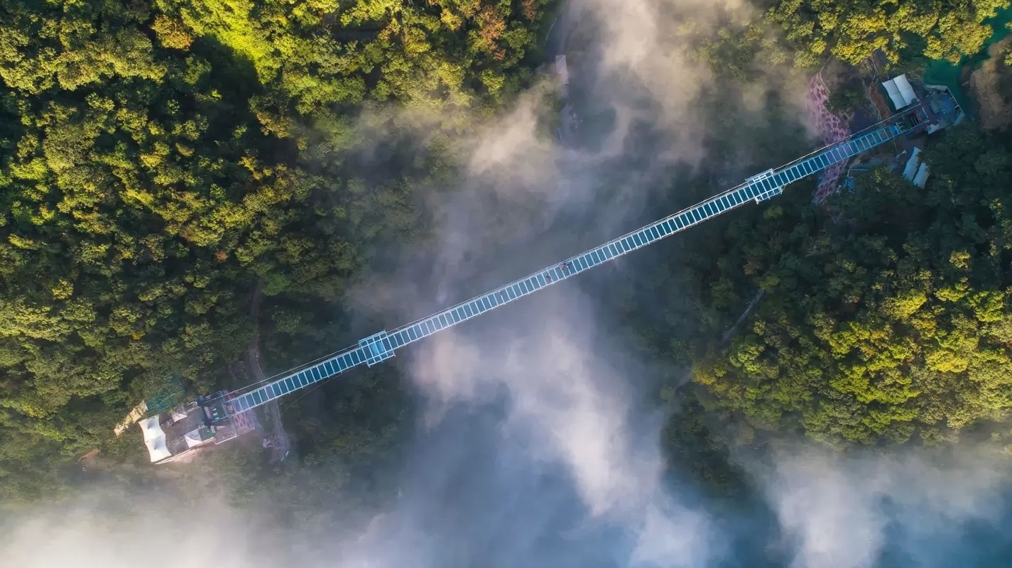 Departing from Guangdong Province / Gu Long Xia Drifting + Gu Long Xia Glass Grand Canyon + Gu Long Xia Grand Waterfall Group Day Tour