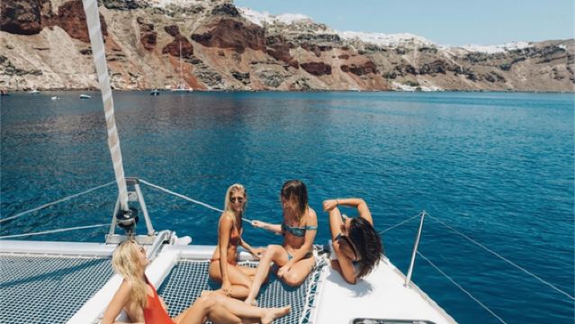 Comfortable Catamaran Cruise in Santorini, Greece - Aegean Sea Sunset/BBQ Meal/16-Person Group
