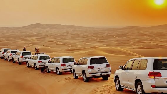 ラクダ乗り、サンドサーフィン、バーベキューディナー付きドバイ砂漠サファリ