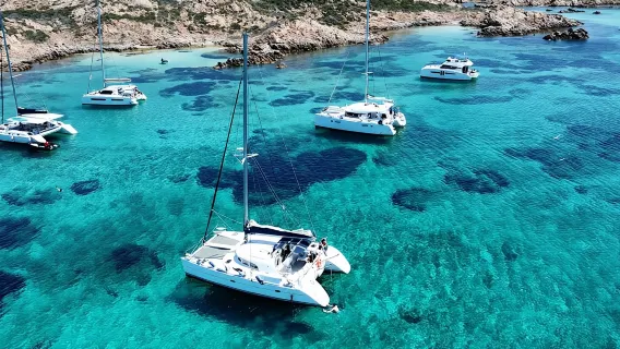 Catamaran tour Magdalene Archipelago from Cannigione from 12 mt..