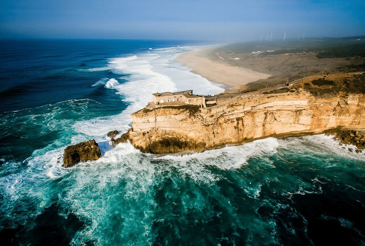 From Lisbon: Tour to Óbidos and Nazaré - Medieval Village, Ginja, and Giant Waves