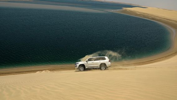 ドーハ:ラクダ乗り、サンドボーディング、内海を楽しむ砂漠サファリ