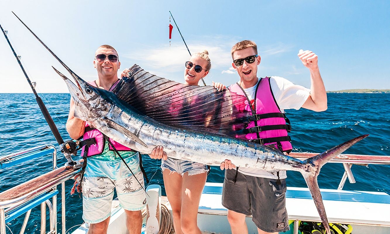 1-day tour of shared boat sea angling from Phuket to Racha Yai Island with optional private boat for snorkeling and onboard fresh seafood preparation