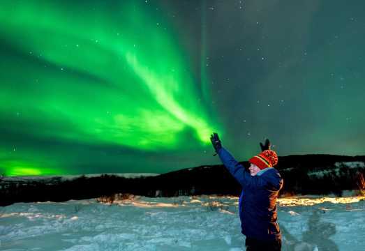 Tromso Northern Lights Bus Tour with Free Photography in Norway