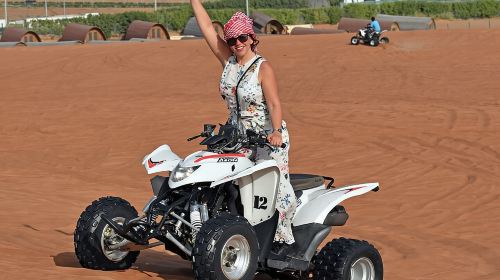 Dubai Quad Bike Tour with Camel Ride and BBQ Dinner 1
