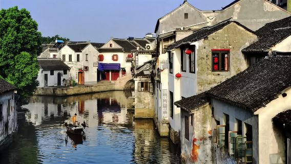 Частный дневной тур в водный городок Тунли в Сучжоу с прогулкой на лодке и местным обедом из Шанхая