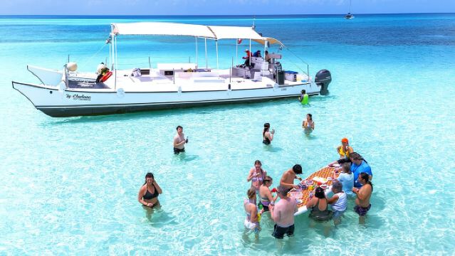Catamaran Snorkel Avontuur naar El Cielo en The Money Bar Beach