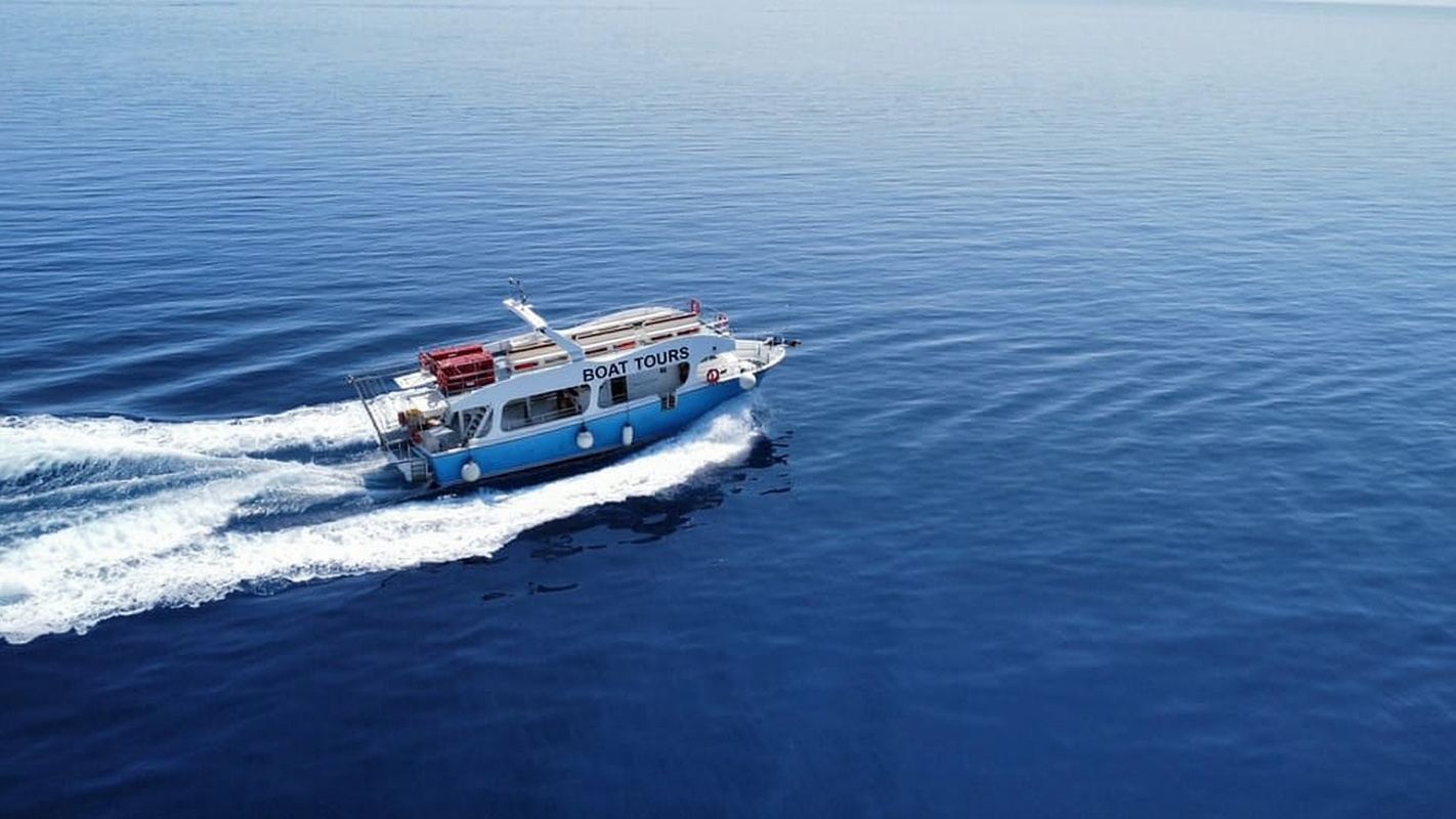 From Skala: Ithaca Day Cruise with Swim Stops & Free Time