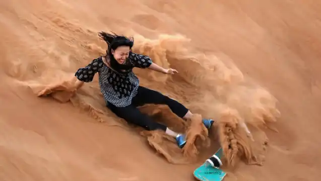 Abu Dhabi Evening Desert Safari Half-Day Tour [Dune Bashing/Shows/City Transfers/Dinner]