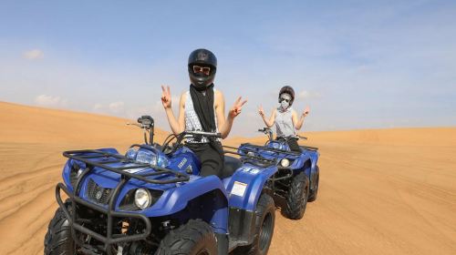 Red Dunes Safari by Quad Bike, Camel Ride, Sandboarding and BBQ at Al Khayma Camp Day Tours 3