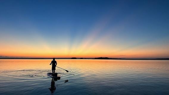 Sunrise on Paddleboard with breakfast in the lagoon of 7 colors