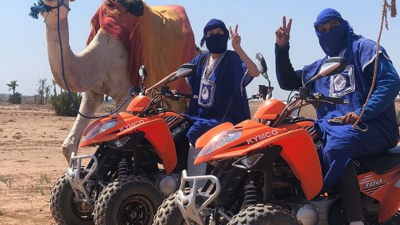 Sensational quad and camel ride in the palm grove