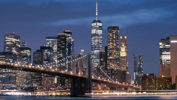 New York City: Skyline-Bustour bei Nacht mit Pizzastück
