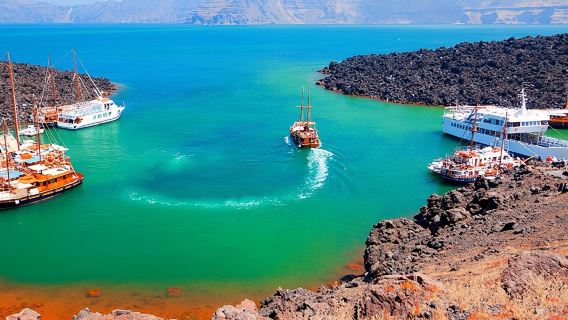 1-day tour to Santorini Volcano Island, Greece|King Hylas wooden sailing boat at sea|multi-zone transfer