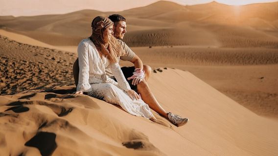 Private Evening Desert Safari with BBQ Dinner, Camel Ride And Sand Boarding