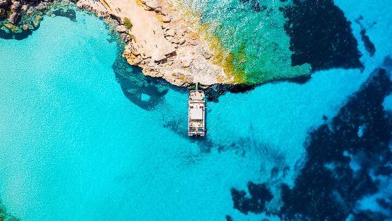 Ibiza Beach Hopping Cruise with Paddleboards, Drinks and Food 6h