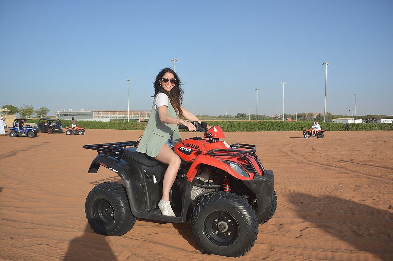 4 Hours Desert Tour with Quad Bike Camel Ride & Sandboard