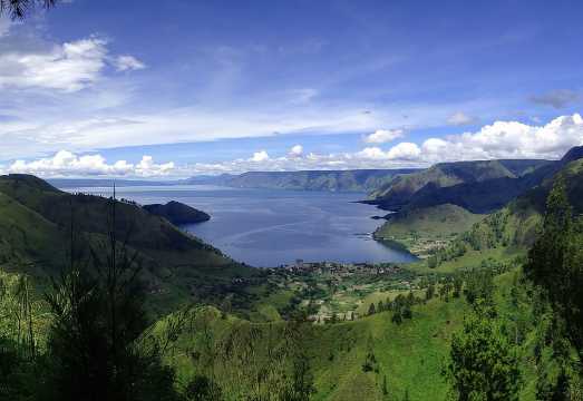 One day tour to explore brastagi High land & lake Toba departure from Medan