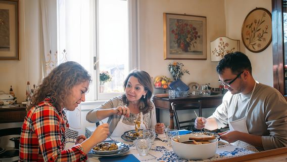 Market tour and dining experience at a Cesarina's home in Modena