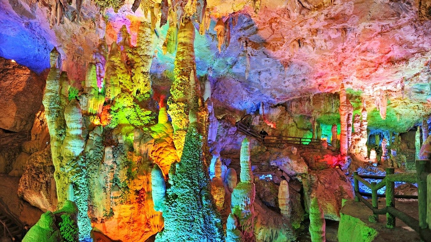 Tour alla Grotta di Jiuxiang + Anatra Arrosto di Yiliang + Foresta di Pietra