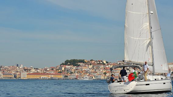 Lisbon old town sailing cruise with a welcome drink