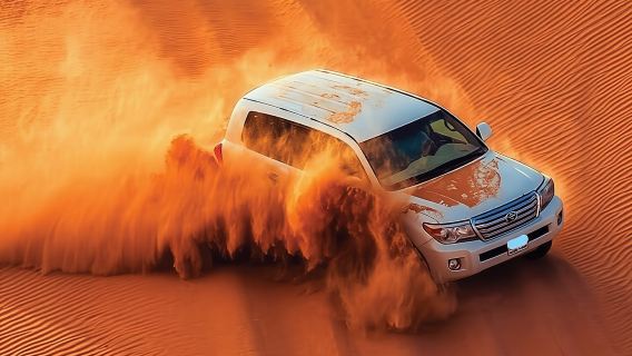 Safari VIP por el desierto: paseo en camello, sandboarding y cena barbacoa