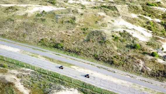 Lisse: Selbstfahrende Dünen- und Strand-Audiotour im Elektroauto