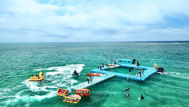 Half-day tour to Mibaru Beach marine park in Okinawa: glass boat, snorkeling, SUP, canoe and fishing experience