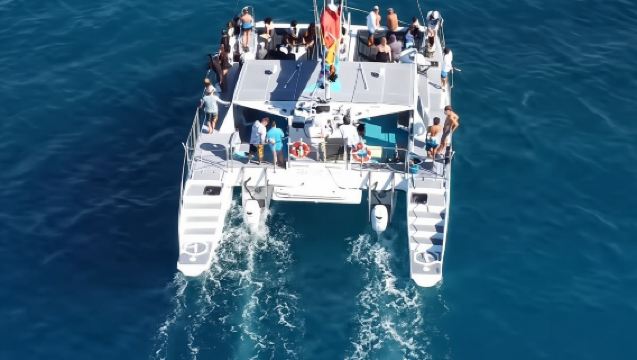 Board from Waikiki Beach for Aloha Hour Sail on Hāwea Catamaran