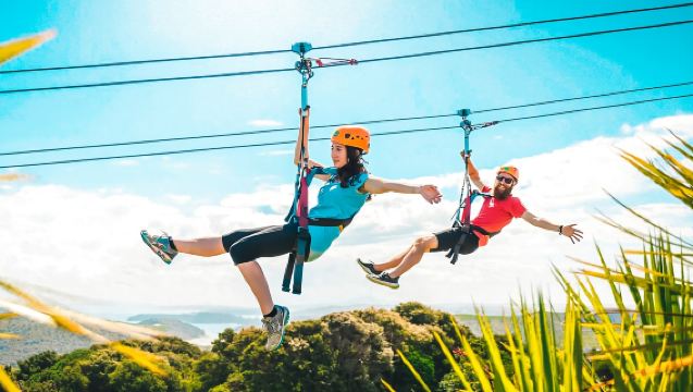Thailand Travel: Koh Samui Jungle Leap. Travel through the tropical rainforest and overlook the ocean. Treetop coffee to check in and take photos. Optional hotel pick-up and drop-off for multiple sessions.