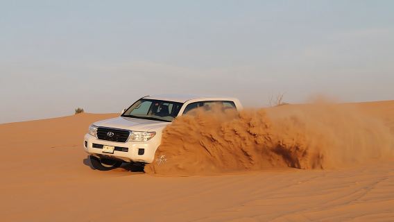 Desert safari with sandboarding and dinner from Dubai